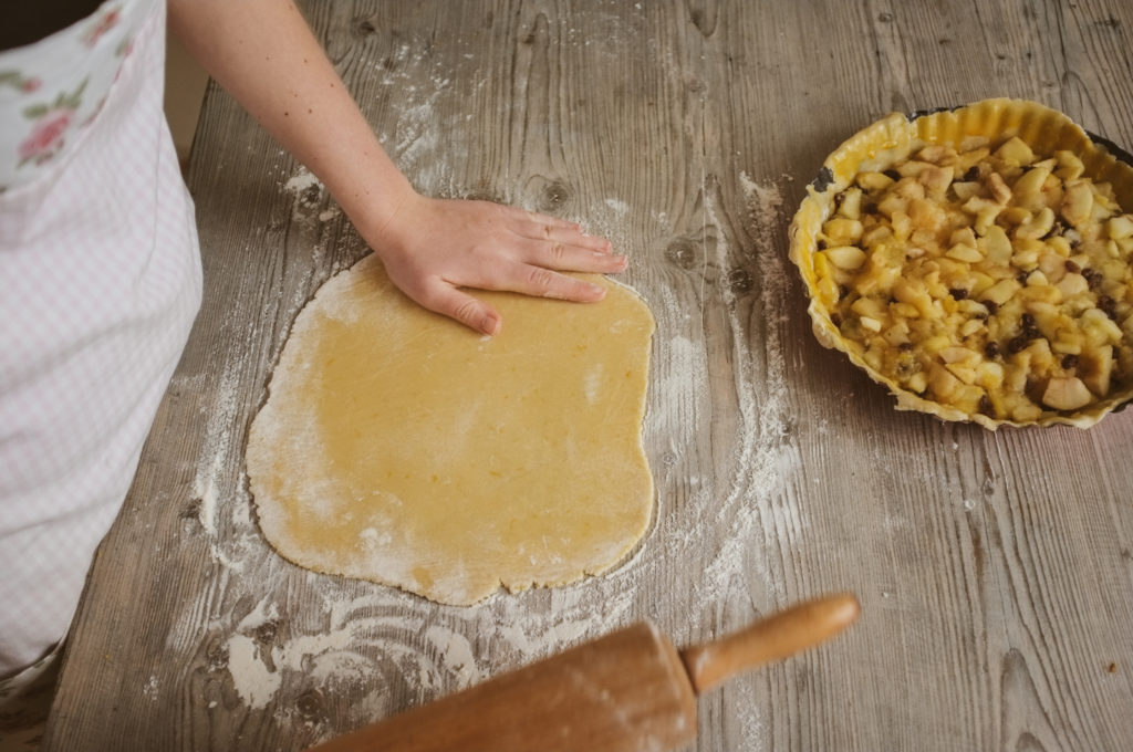 preparation of a homemade apple pie, step-by-step, window light