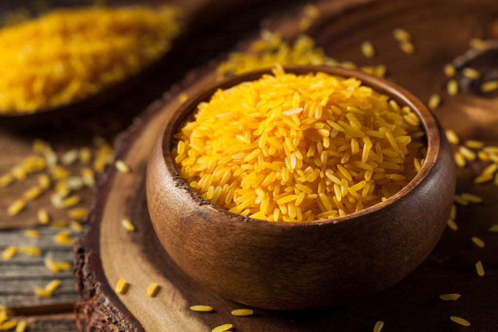 Raw Organic Yellow Saffron Rice in a Bowl